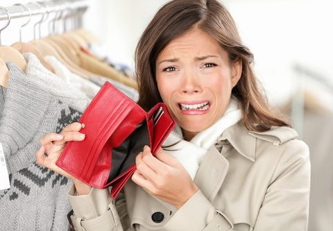 woman spending beyond her means