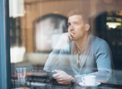 man thinking about credit consolidation loans