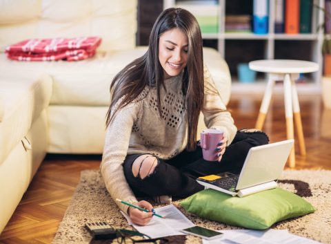 young woman researching student loans