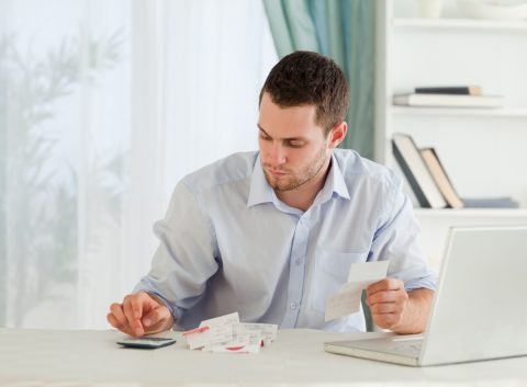 man working to pay off debt