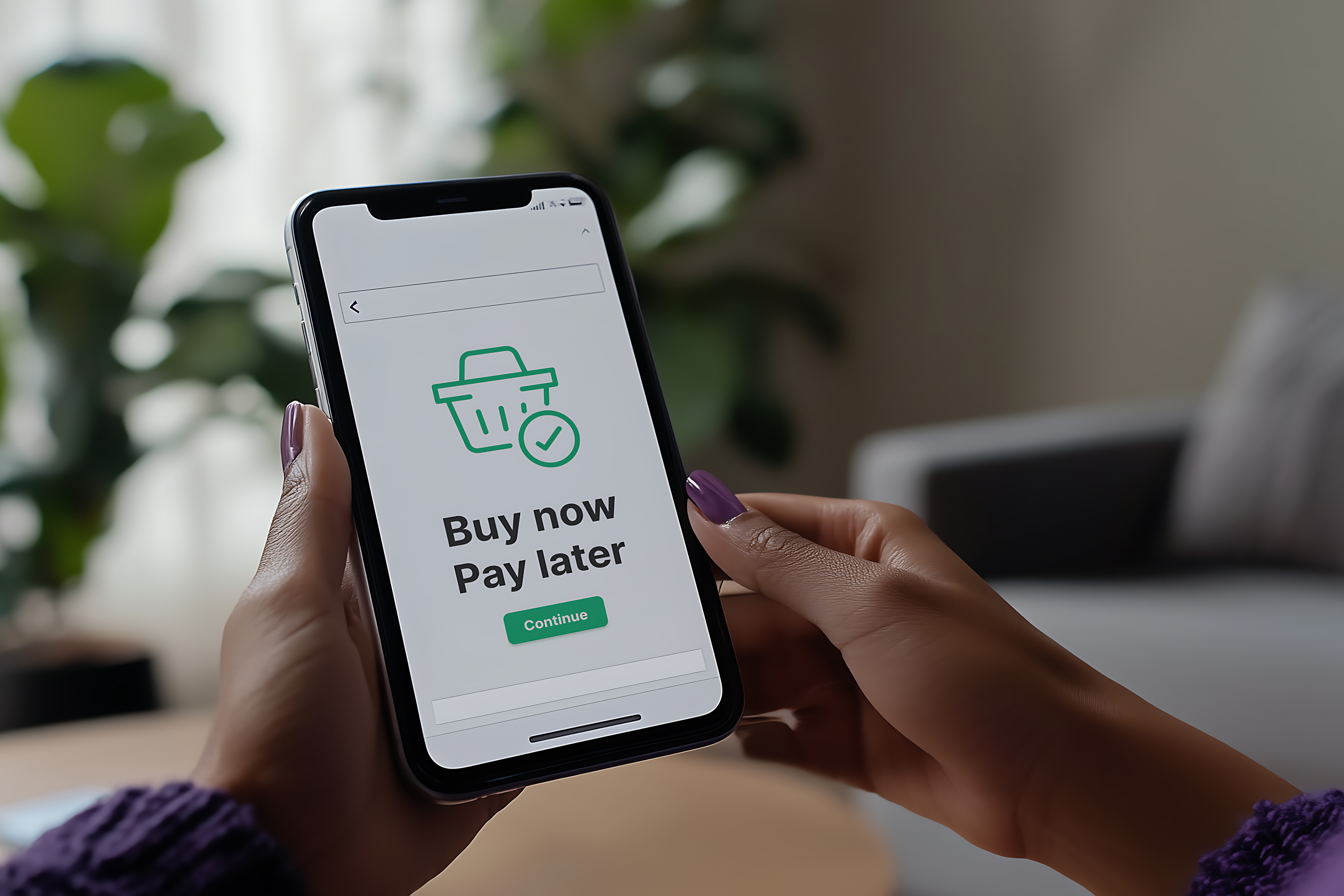 hands holding screen that says buy now pay later